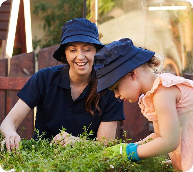 a childcare worker is having fun with a child